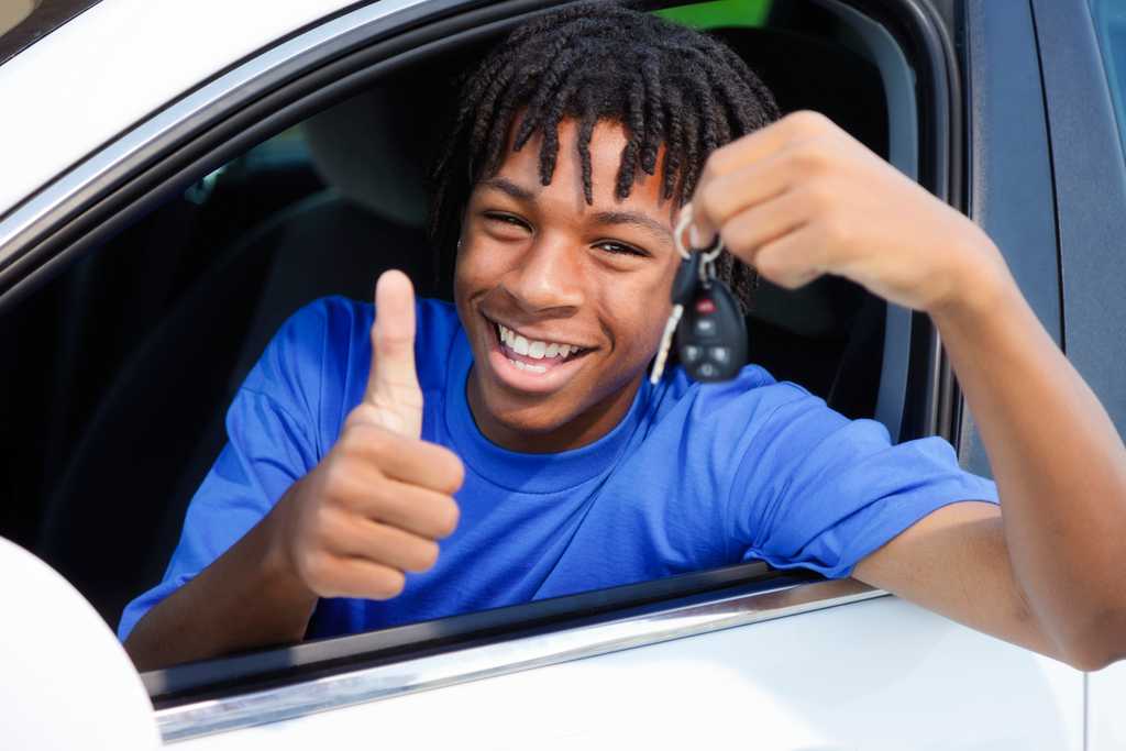 16 year old black male in car holding car keys